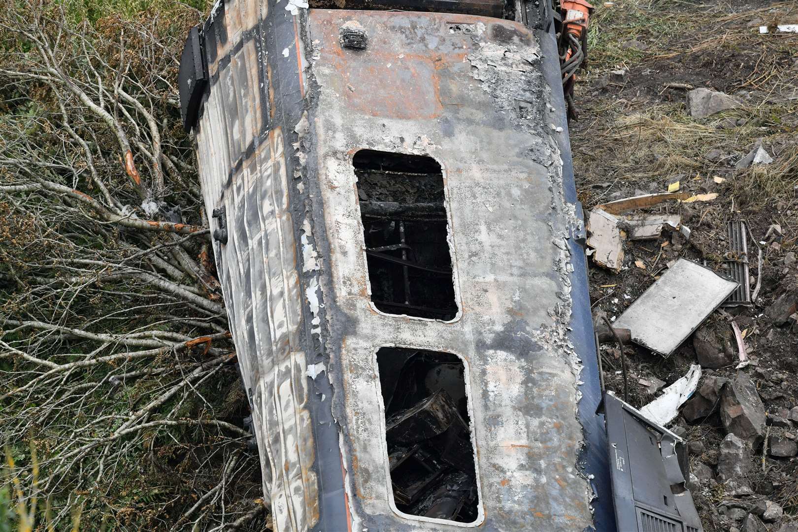 Seats were burnt out and paint flaked from the carriages in the carnage (Ben Birchall/PA)