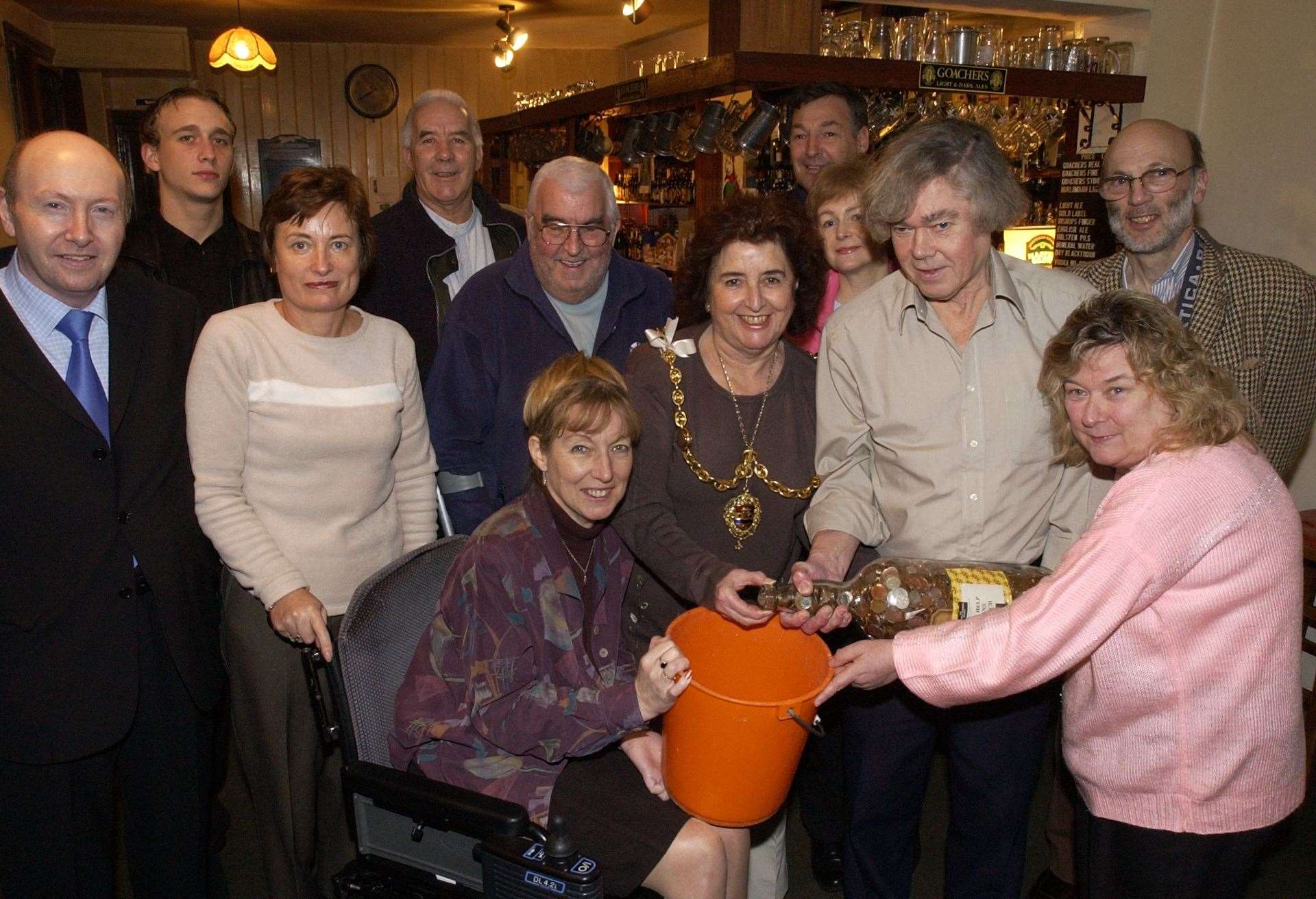 Wendy Marlow (pictured in pink) at a charity event at the Rifle Volunteers Pub, which she ran with her husband Alan until their retirement in 2002. Picture John Wardley