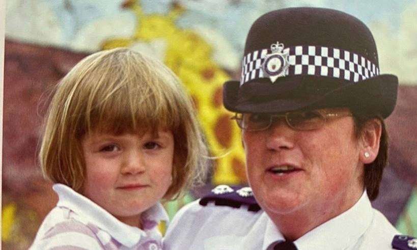 An old picture of Chief Inspector Nicky Carter with a young Charlotte (Dyfed Powys Police/PA)