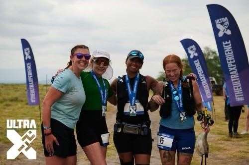 Tricia Sinclair with women she met and ran with during the ultra-marathon (Ultra X/Luke Jarmey)