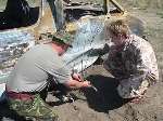 Sgt John Lewis, from the Maidstone-based Royal Engineers, shows a bar mine to reporter Ed Cook