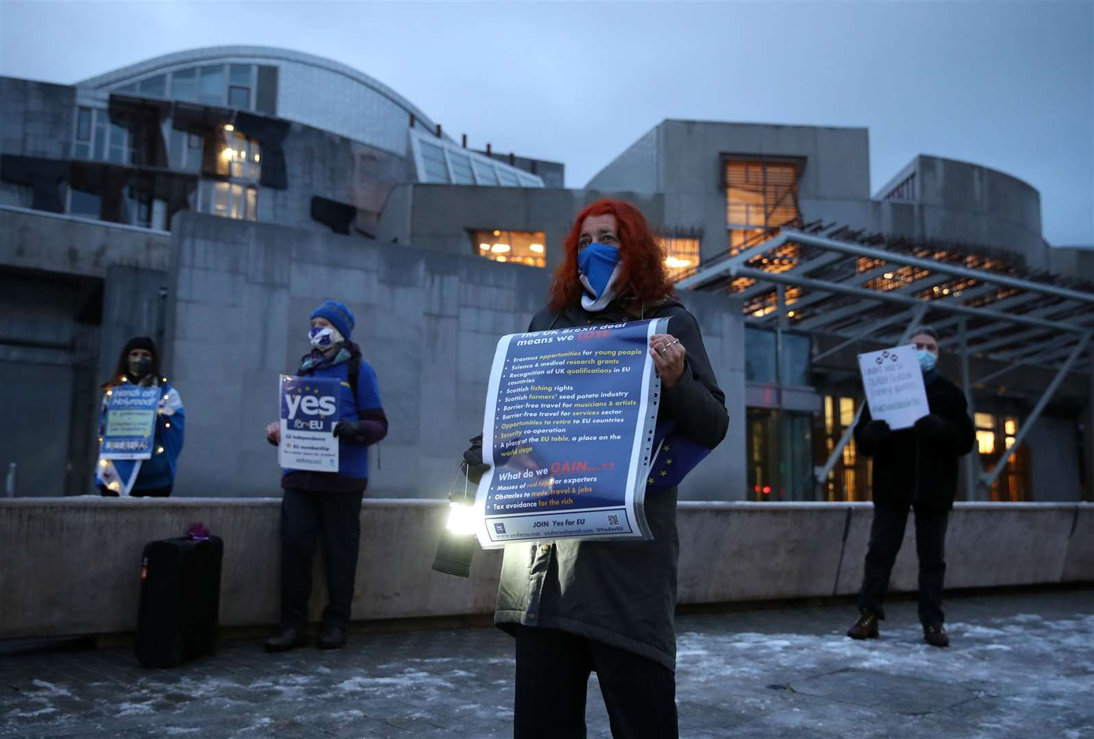 Supporters of the campaign group Yes for EU staged an anti-Brexit protest outside the Scottish Parliament on Thursday (Andrew Milligan/PA)