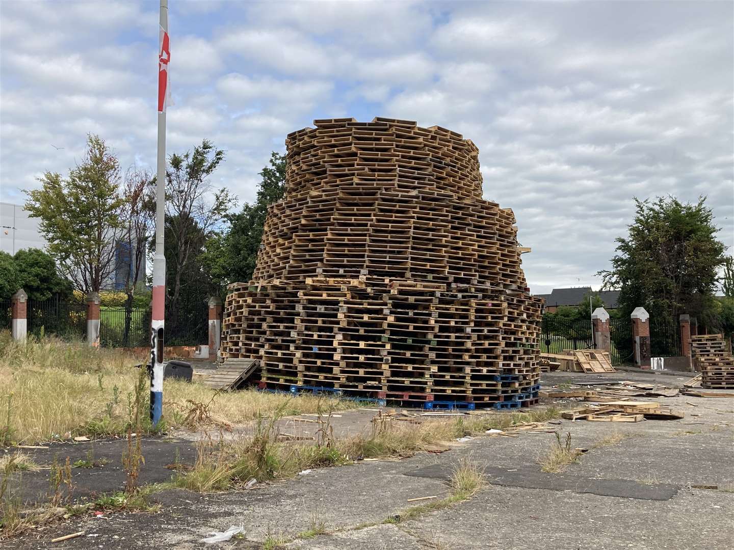 A loyalist bonfire being built at Adam Street in north Belfast (Rebecca Black/PA)