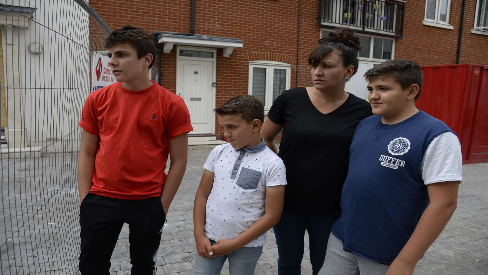 Anna-Marie Carman and her sons, left, Jamie Price,15 and Levi, 10 and Billy Carmen,12, right.