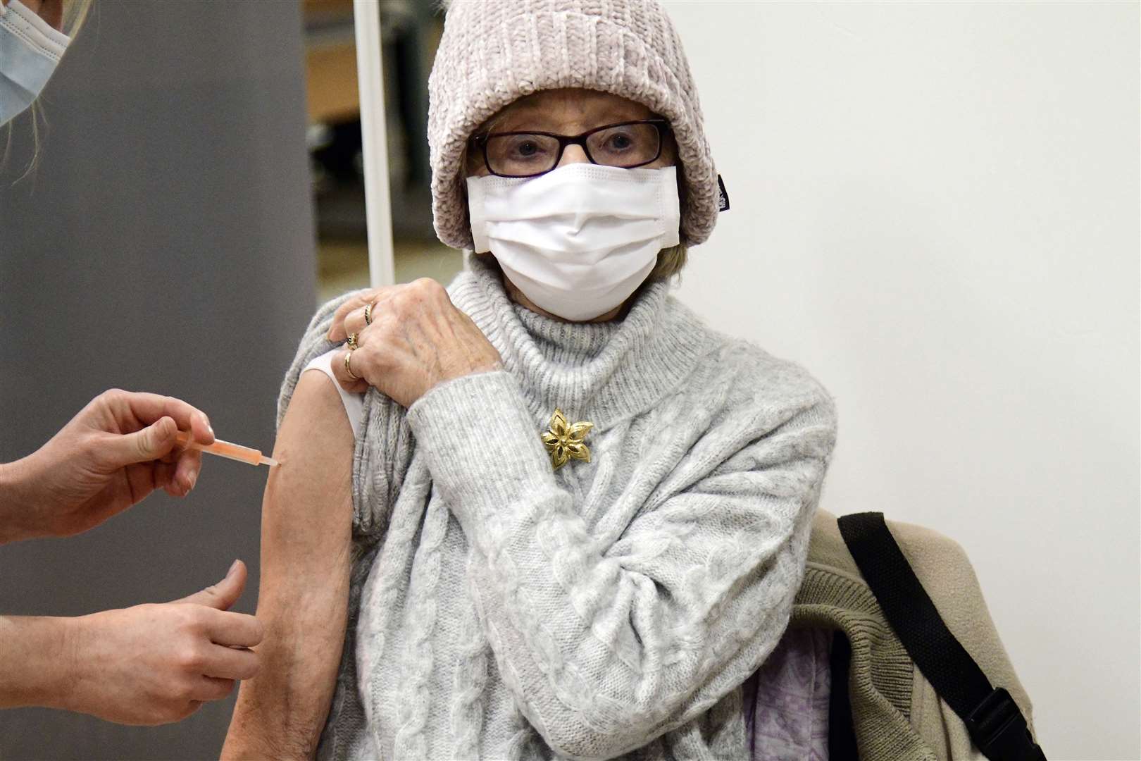 A woman receives her Covid-19 vaccination at the former Debenhams. Picture: Barry Goodwin