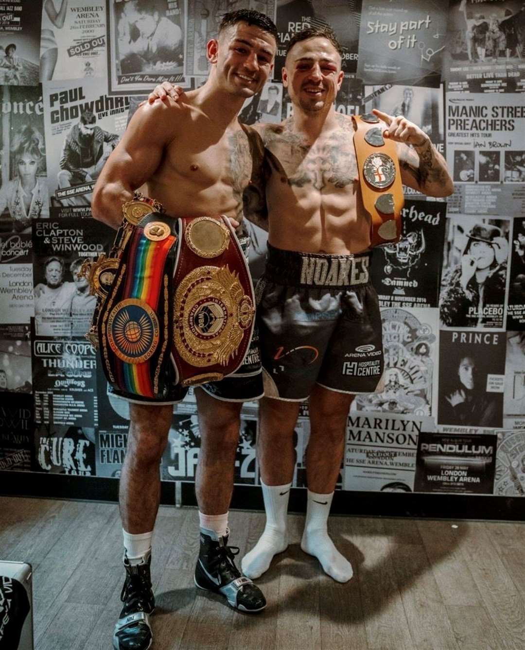 Brothers Sam and Sean Noakes with their belts backstage at Wembley Arena last Saturday Picture: @johnnyghostsphoto