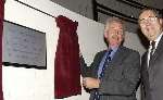Sir Sandy Bruce-Lockhart unveils the plaque, watched by Paul Watkins. Picture: DAVE DOWNEY