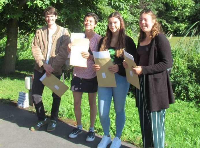 Pupils at Barton Court Grammar School in Canterbury collect their A-level results