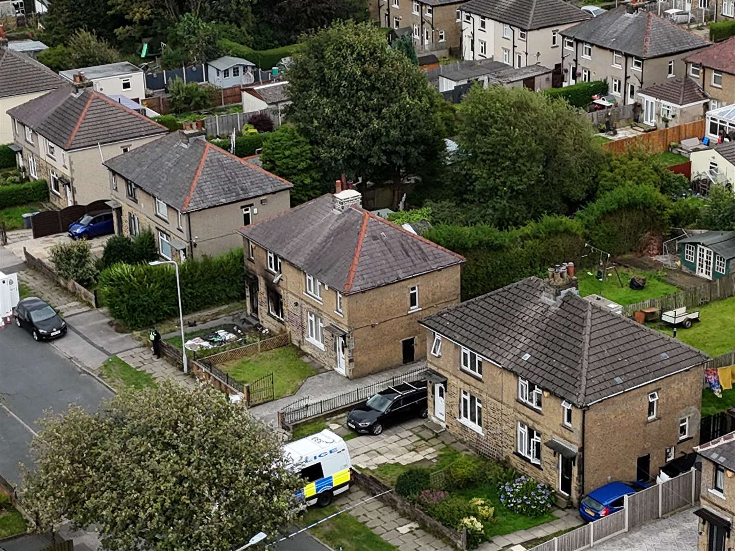 The scene in Westbury Road, Bradford, following the fatal fire (Peter Byrne/PA)