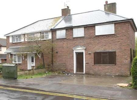 The house in Osborne Road, now boarded up, where the family was evicted