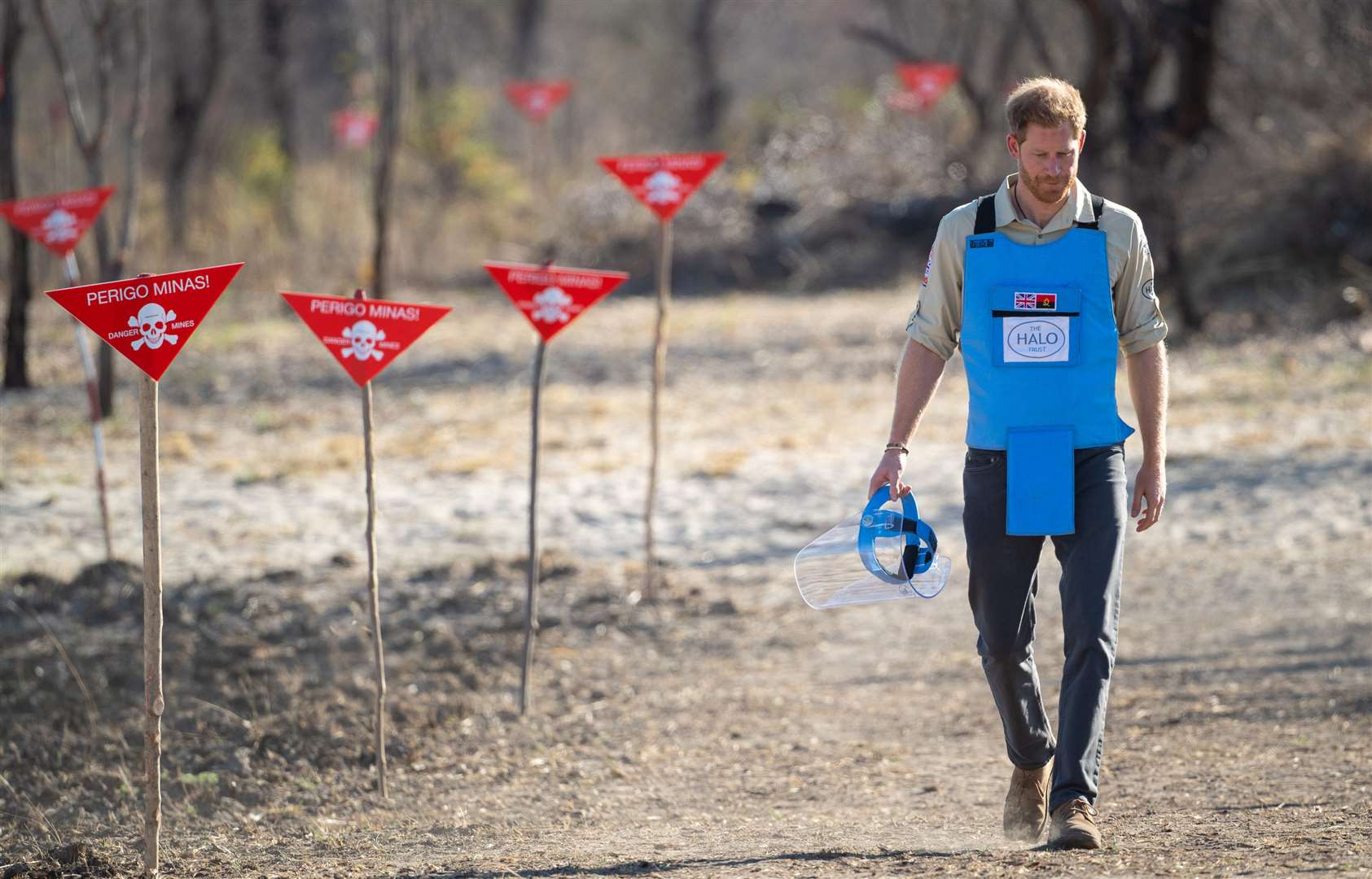 Harry follows in Diana’s footsteps by walking through a minefield in Dirico, Angola (Dominic Lipinski/PA)