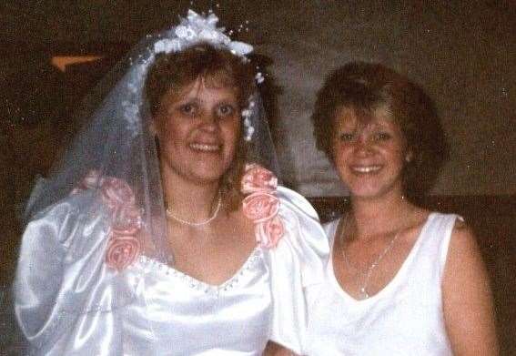 Debbie Griggs on her wedding day pictured with her sister Wendie Rowlinson