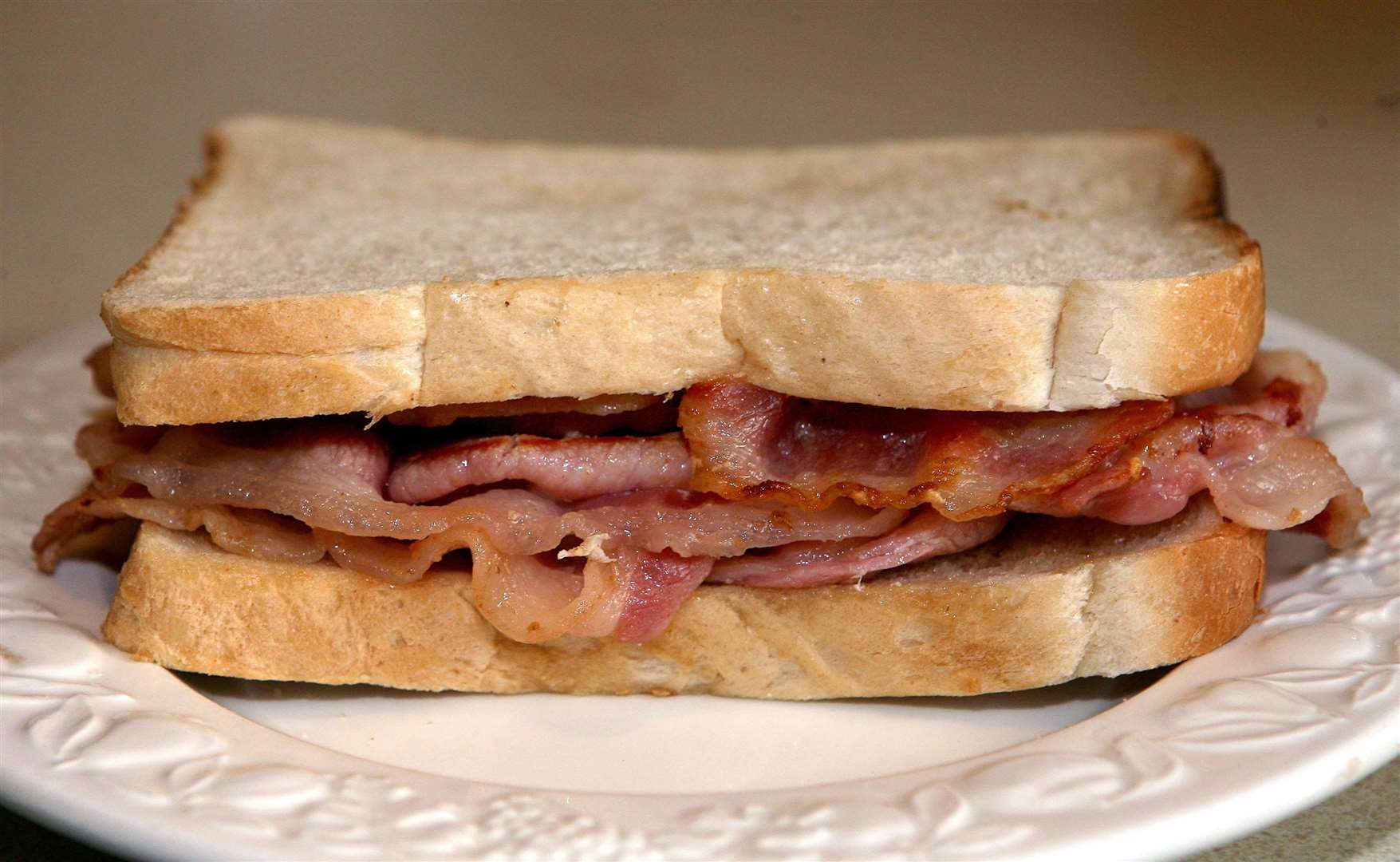 Ed Miliband was famously photographed eating a bacon sandwich as leader of the opposition around a decade ago (PA)