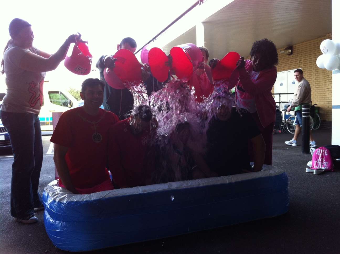 The volunteers were all engulfed in icy water outside the store.