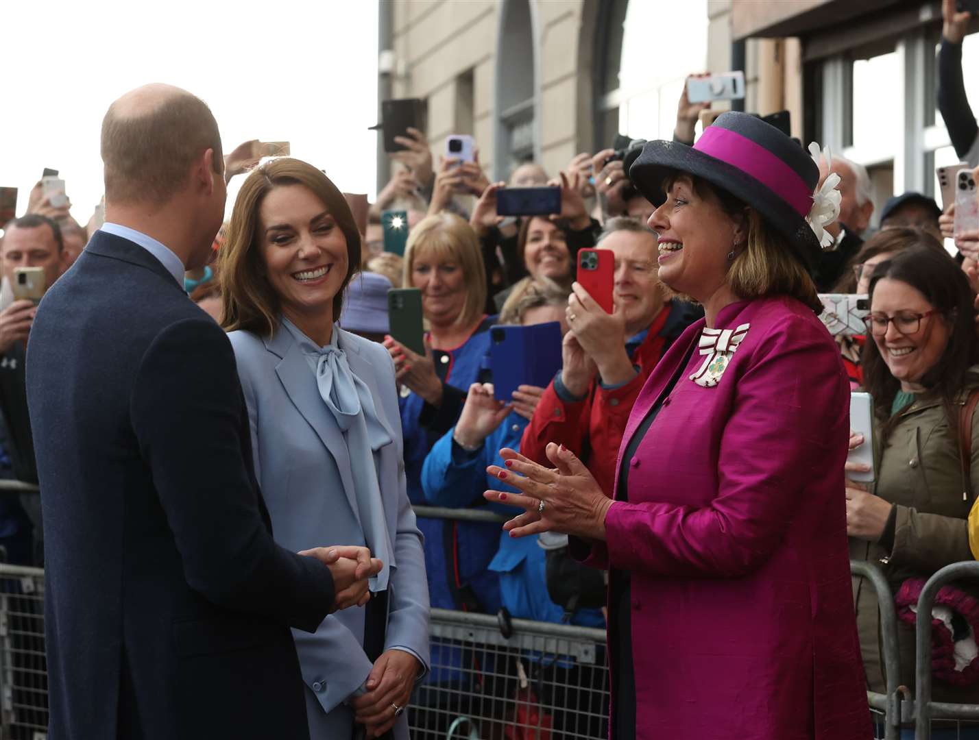 The Prince and Princess of Wales meeting the Vice Lord Lieutenant of County Antrim, Miranda Gordon, as they arrive for a visit to Carrick Connect (Liam McBurney/PA)