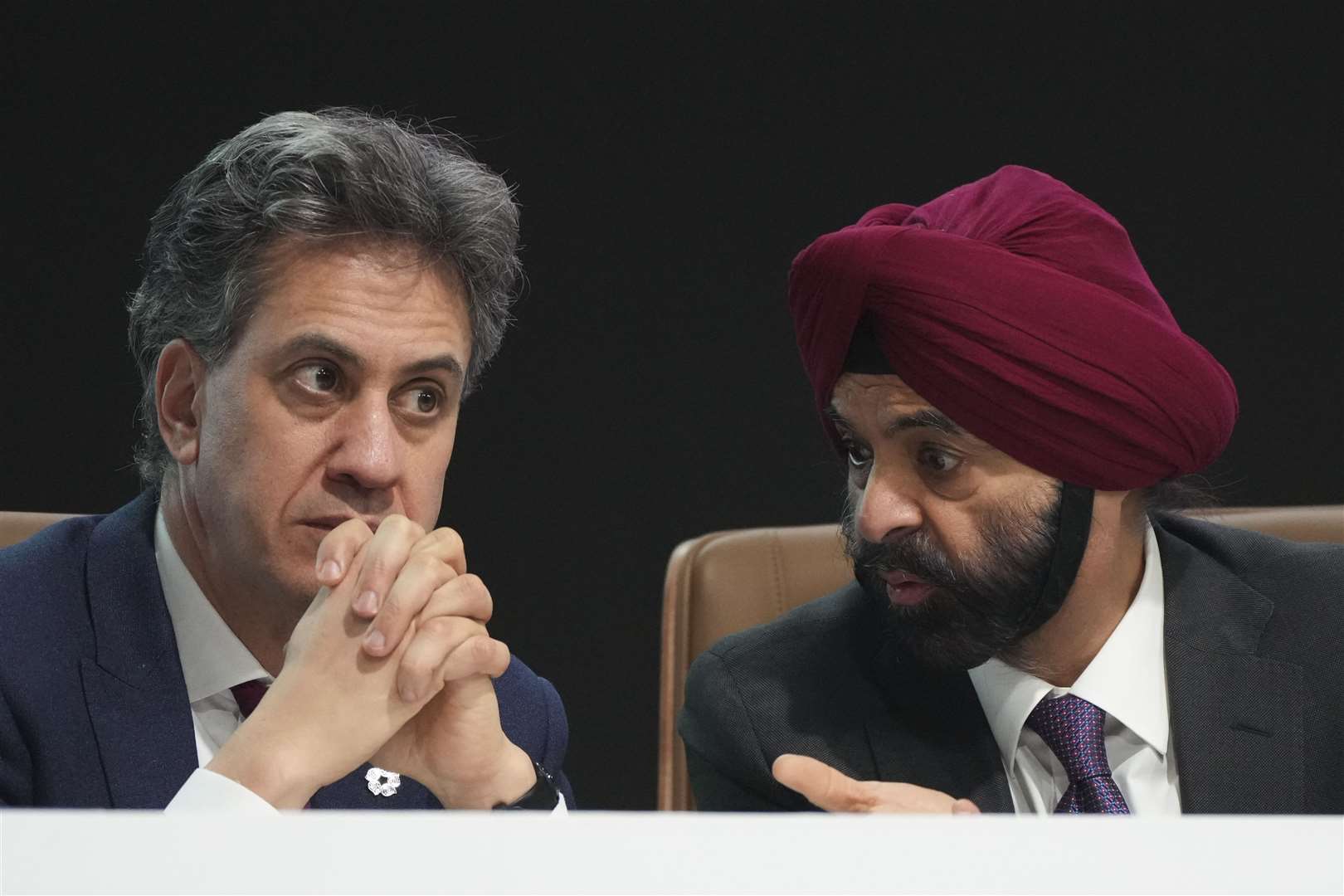 Ajay Banga, World Bank president, right, and Energy Secretary Ed Miliband during Cop29 (Sergei Grits/AP)