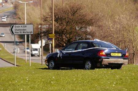 Car crashes on roundabout