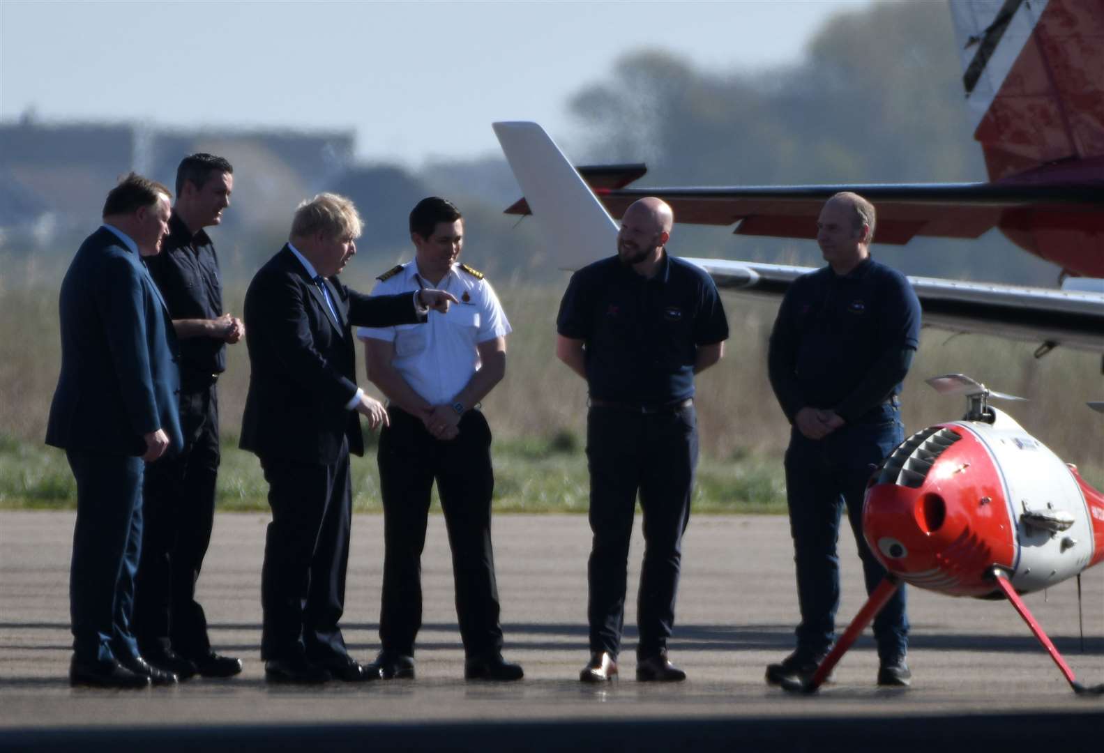 Prime Minister Boris Johnson recently at Lydd airport in Kent, accompanied by Damian Collins, MP for Folkestone and Hythe. Picture: Barry Goodwin