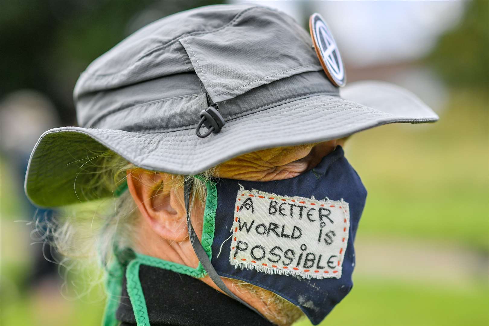 Protesters wore masks…(Ben Birchall/PA)