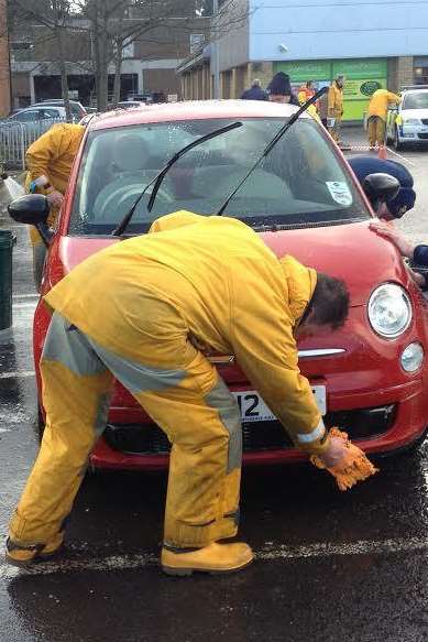 Labour's Clair Hawkins stopped off to get her Fiat 500 washed.