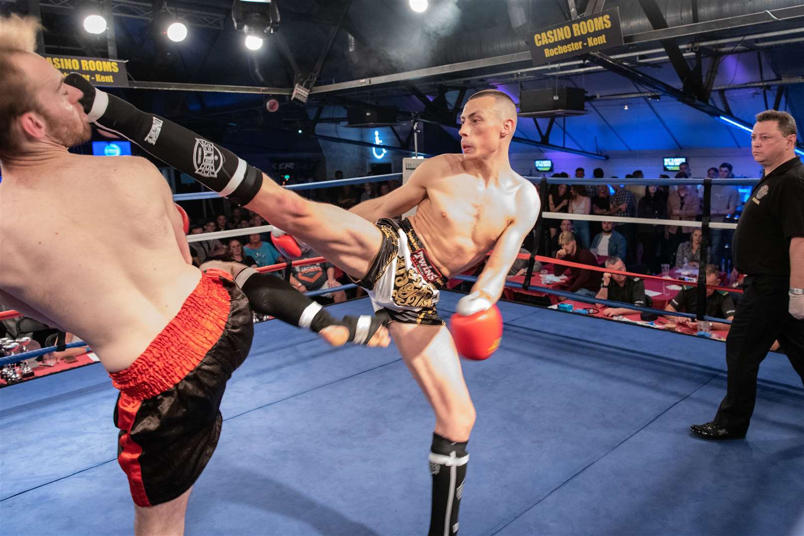 Kickboxing action during 25th anniversary show at Rochester - Will Rogers landing the knockout kick Picture: JON SNAPAWAY