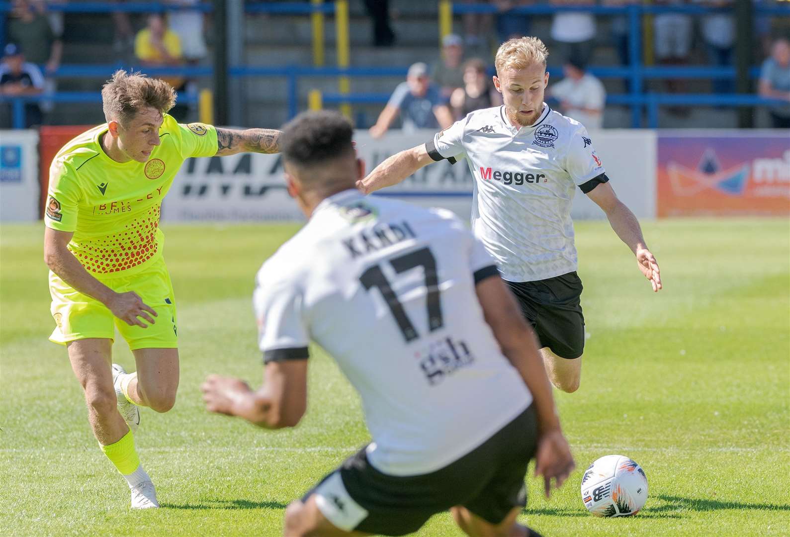 Left-back Alfie Paxman clips the ball forward for Whites. Picture: Stuart Brock