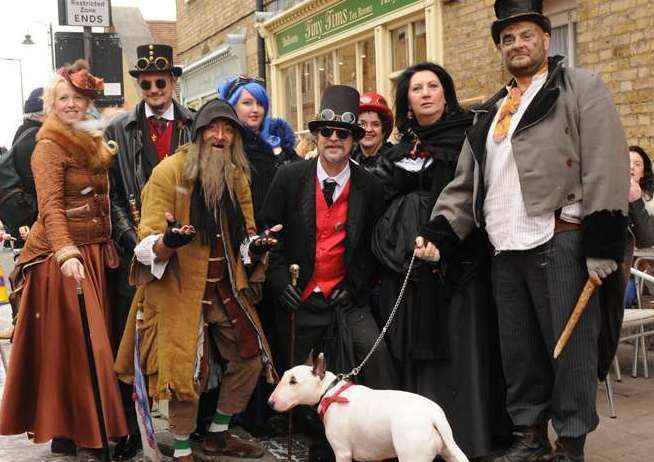 Fagin with fellow Dickensian characters greet festival-goers