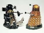 Will you find one of these in your Christmas stocking? Daleks Sec (left) and Caan plan a friendly Christmas invasion.