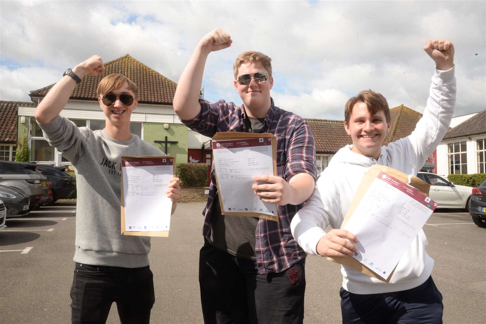 Ben Sayers, Alex Penfold and Bradley Ayling celebrate their A-level results at the St Georges Church of England School, Gravesend