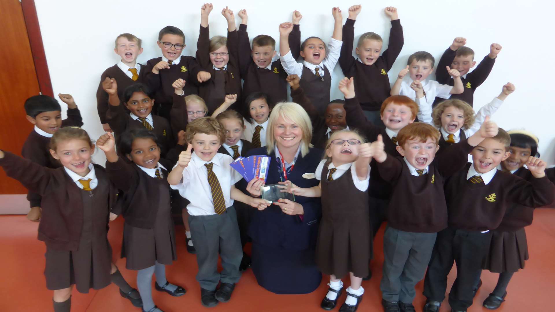 Pupils from St Francis' Catholic Primary School, Maidstone, celebrate Walk to School Month with Sara Williams from Specsavers.