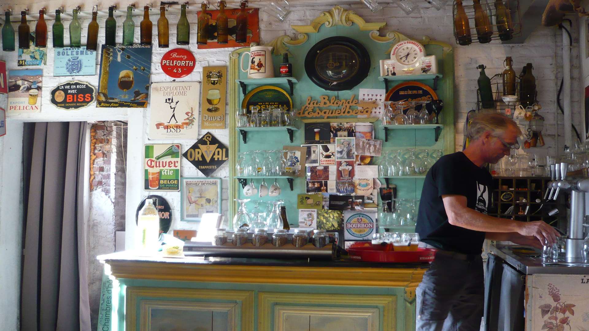 A lovely scene as Daniel Thiriez pours beer at his brewery.