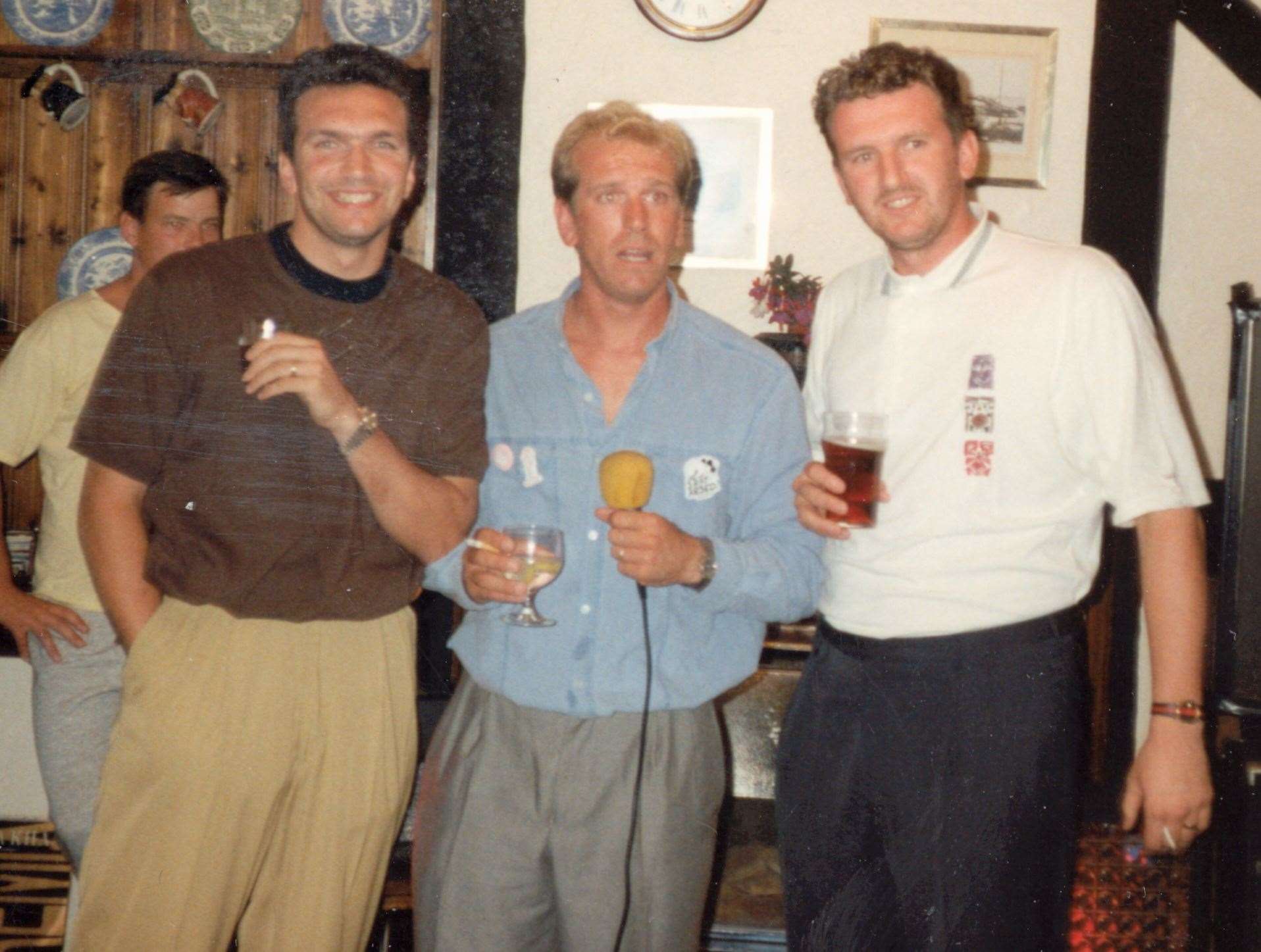 An archive shot showing Razor, left, singing karaoke with his brothers in The Fox. Picture: Sam Ruddock