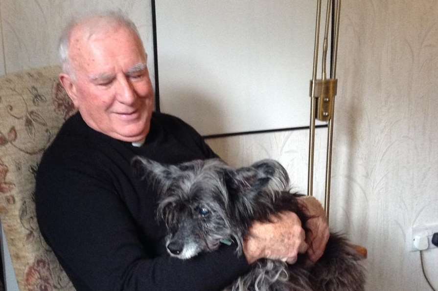 Father Frank Moran with his beloved dog Breeze