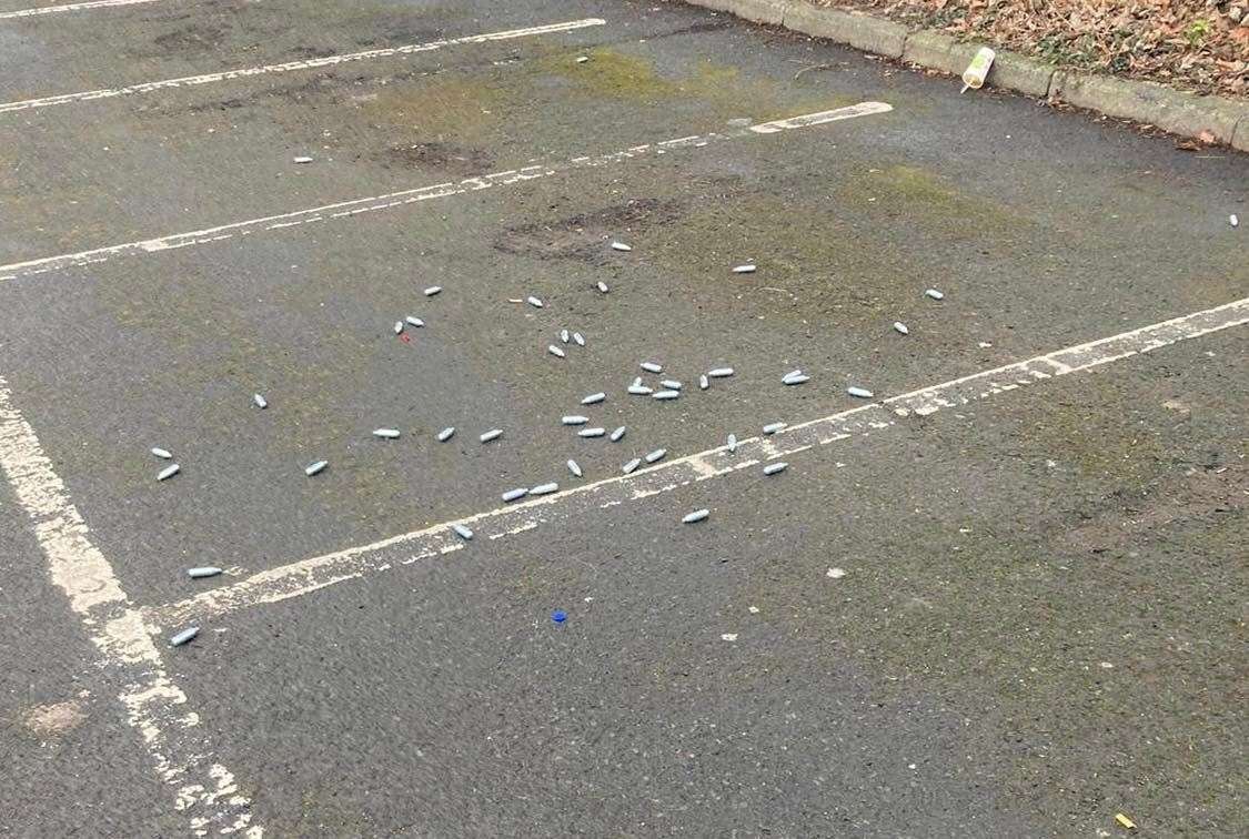 Cannisters left on the ground in the car park Picture: Stuart Bourne