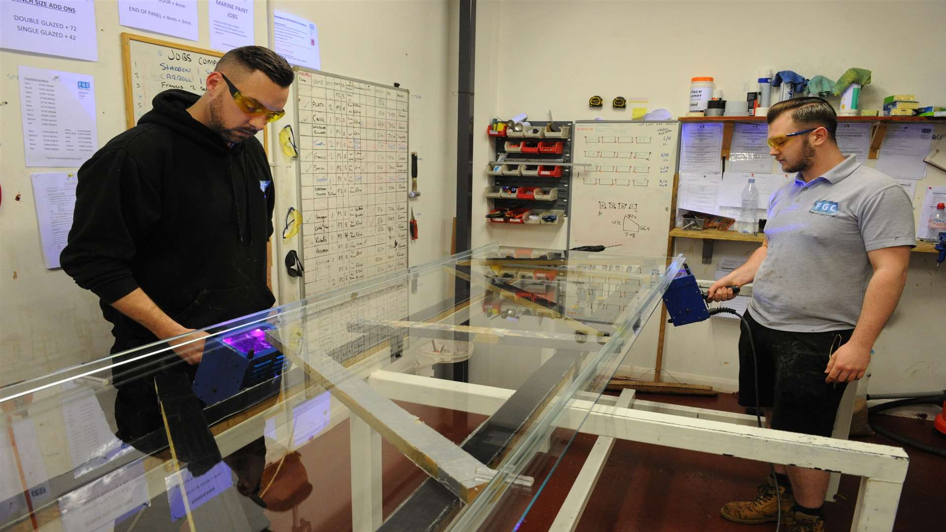 The glass doors being made in the factory