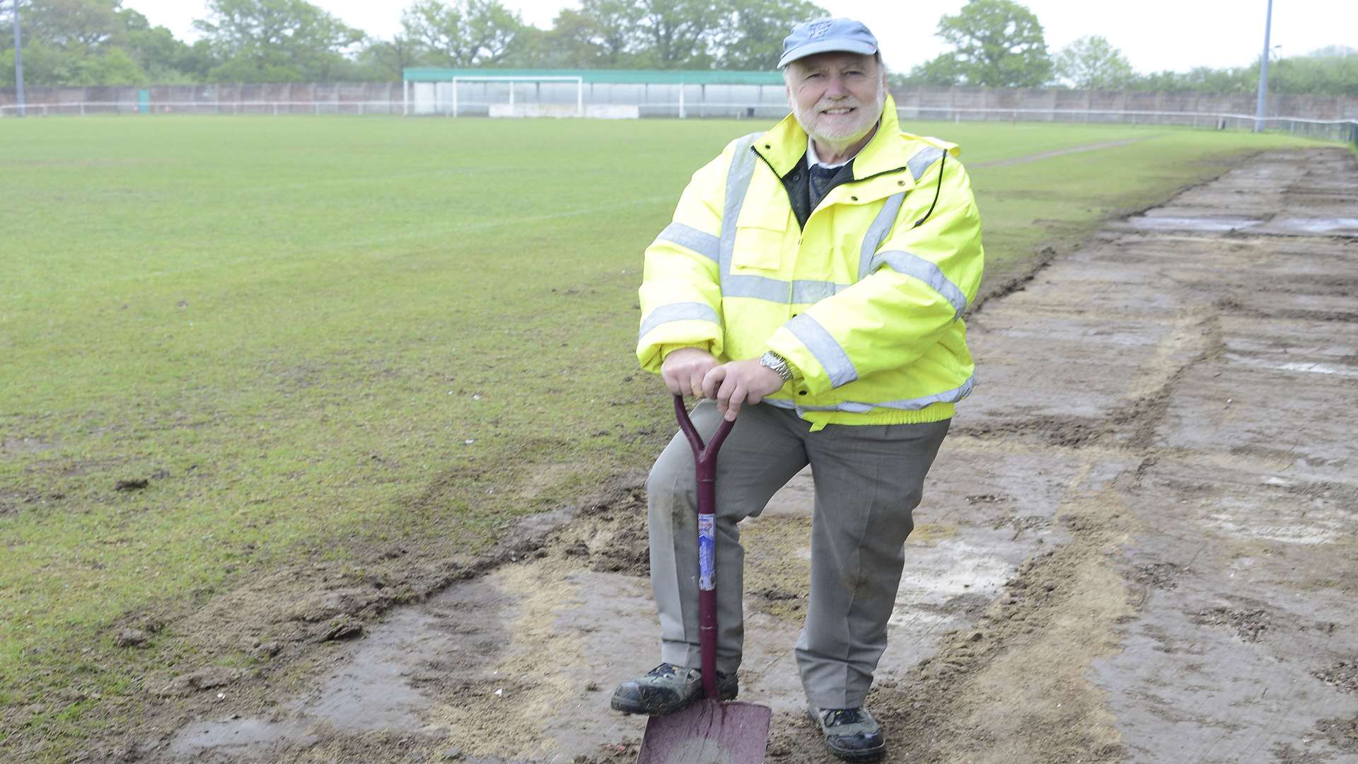 Don Crosbie wields a spade as the old grass pitch at Homelands is dug up in May