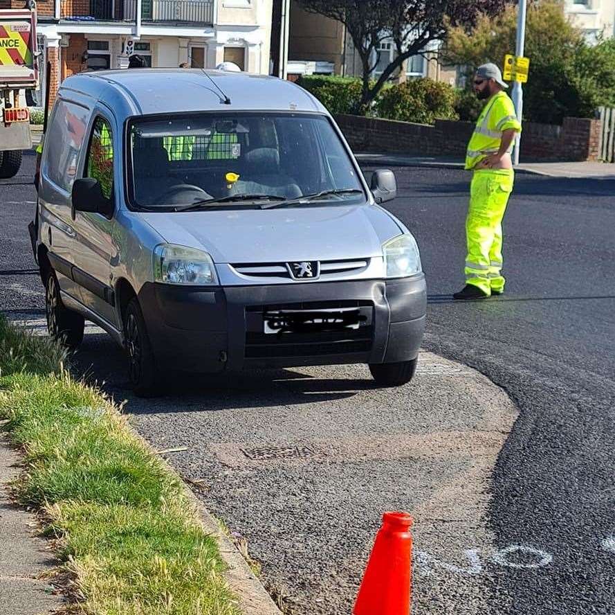 Workmen were forced to lay a road surface around a parked van in Broadstairs. Picture: Lesley Laird