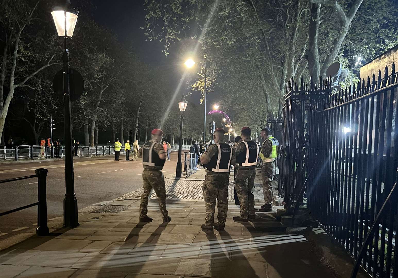 The scene outside Buckingham Palace, where a man was arrested after allegedly throwing suspected shotgun cartridges into the palace grounds (Ben Roberts-Haslam/PA)