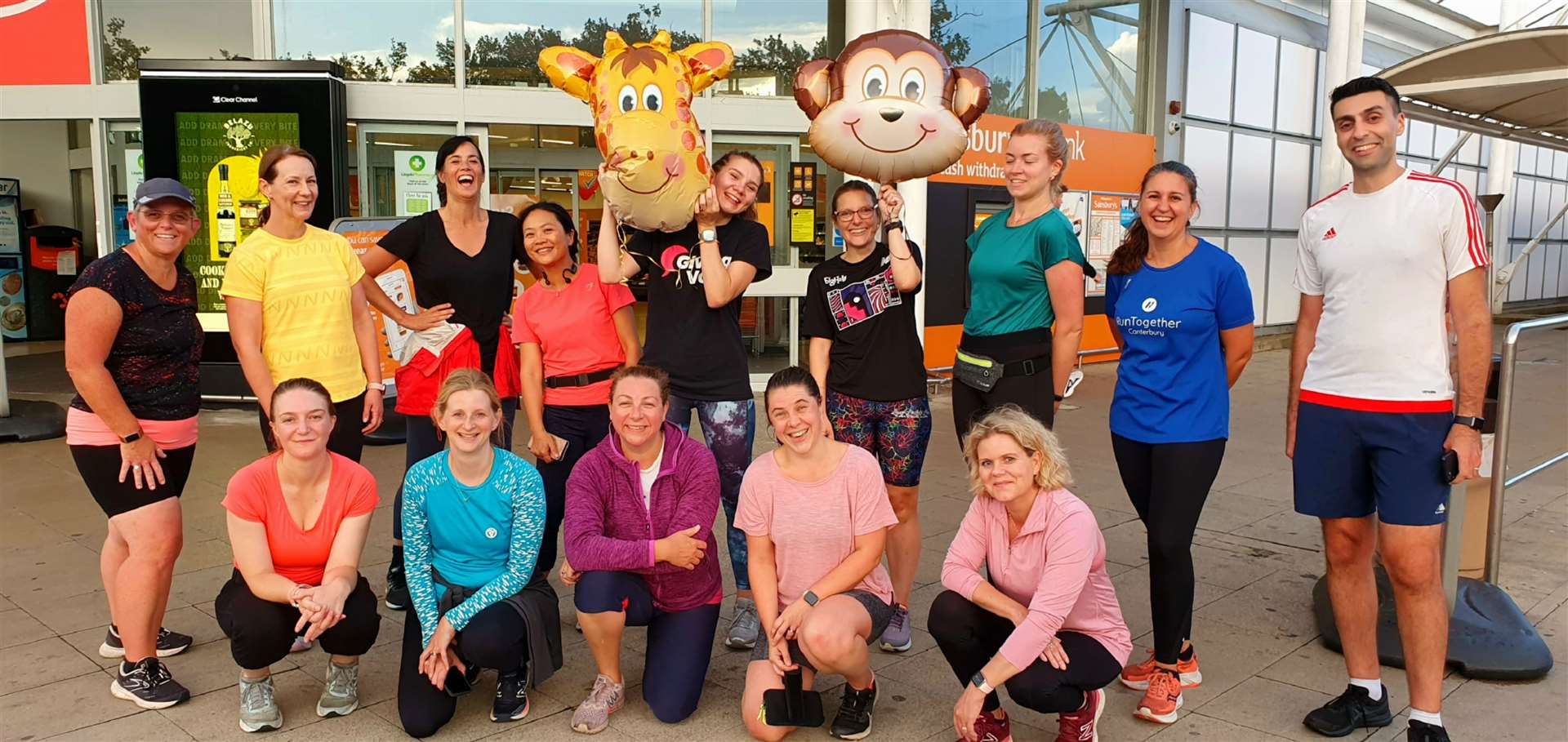 RunTogether Canterbury runners, with new run leaders Hannah and Carolyn Jeffery holding their helium balloons, are on a mission to make running more sociable