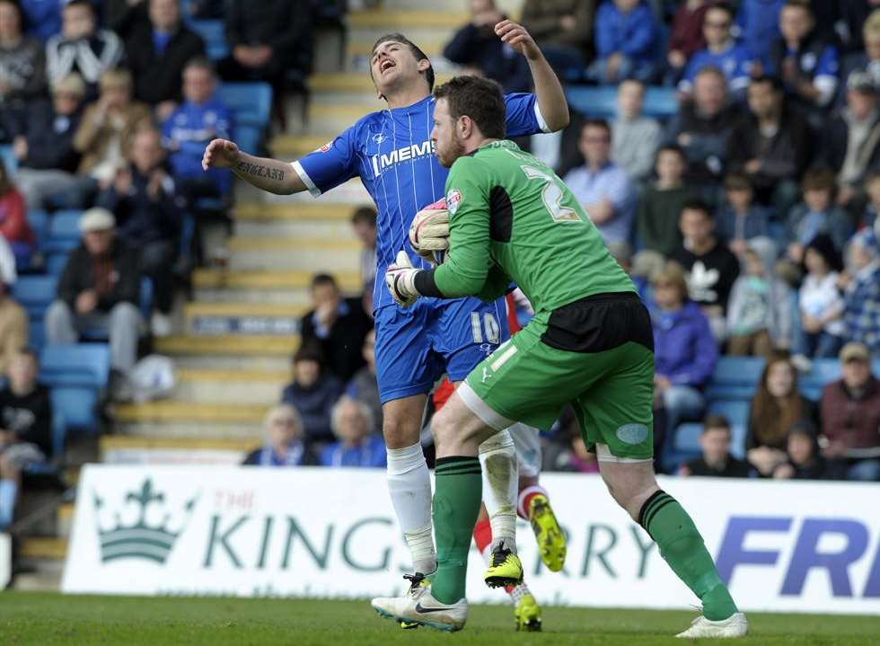 Cody McDonald is denied by Rotherham keeper Adam Collin