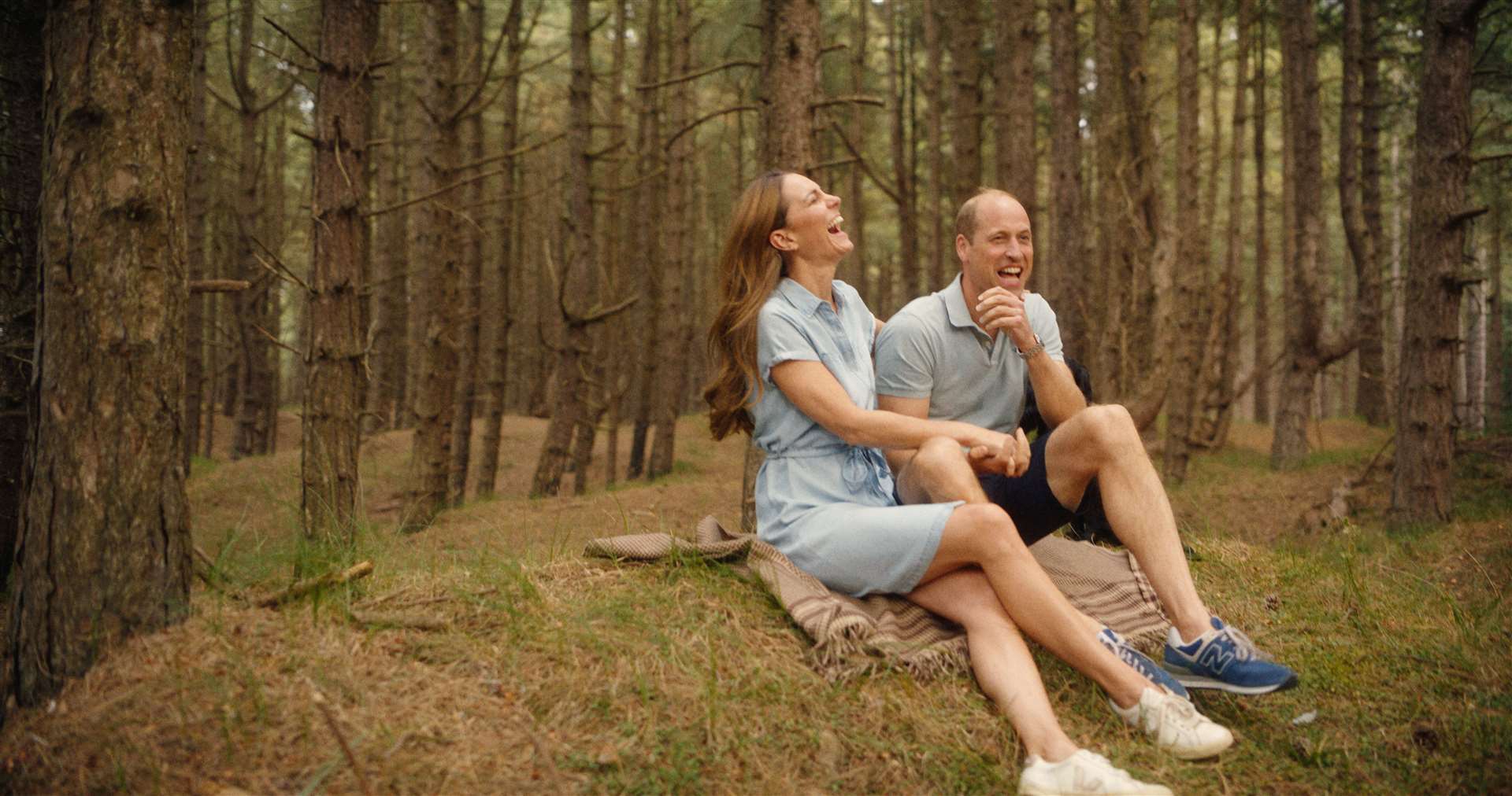 Kate and William sitting together in the woods (Will Warr/Kensington Palace/PA)