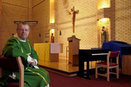 Reverend John Letley, the Roman Catholic Chaplain at Swaleside, in the prison chapel