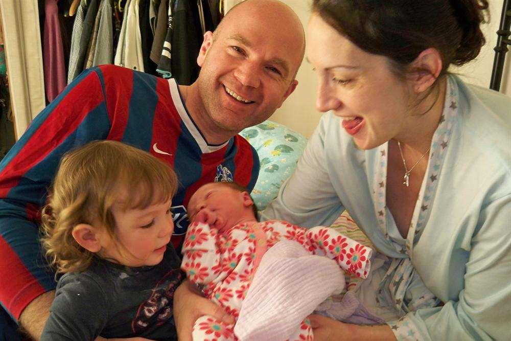 Mike Radford with wife Vicki and daughters Molly and Florence