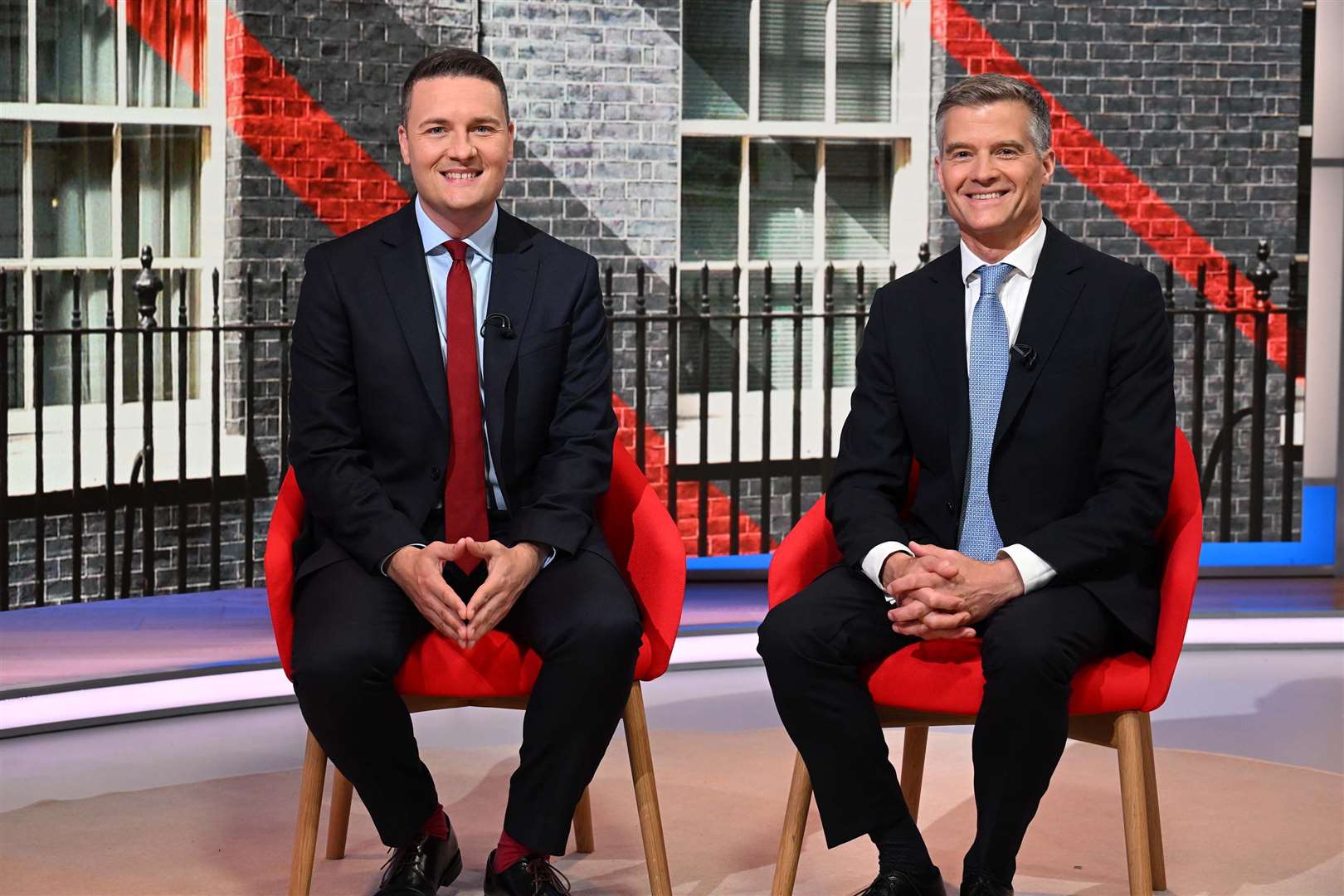 Shadow health secretary Wes Streeting and Transport Secretary Mark Harper followed each other around the broadcast studios (Jeff Overs/BBC/PA)