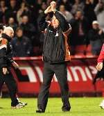 Les Reed applauds the Charlton fans. Picture: ANDY PAYTON