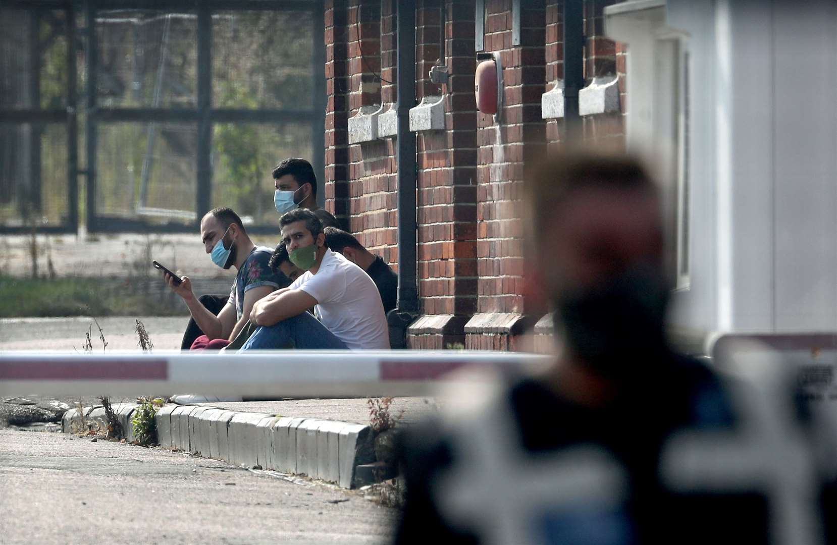 A group of men, thought to be migrants, at Napier Barracks in Folkestone (Gareth Fuller/PA)