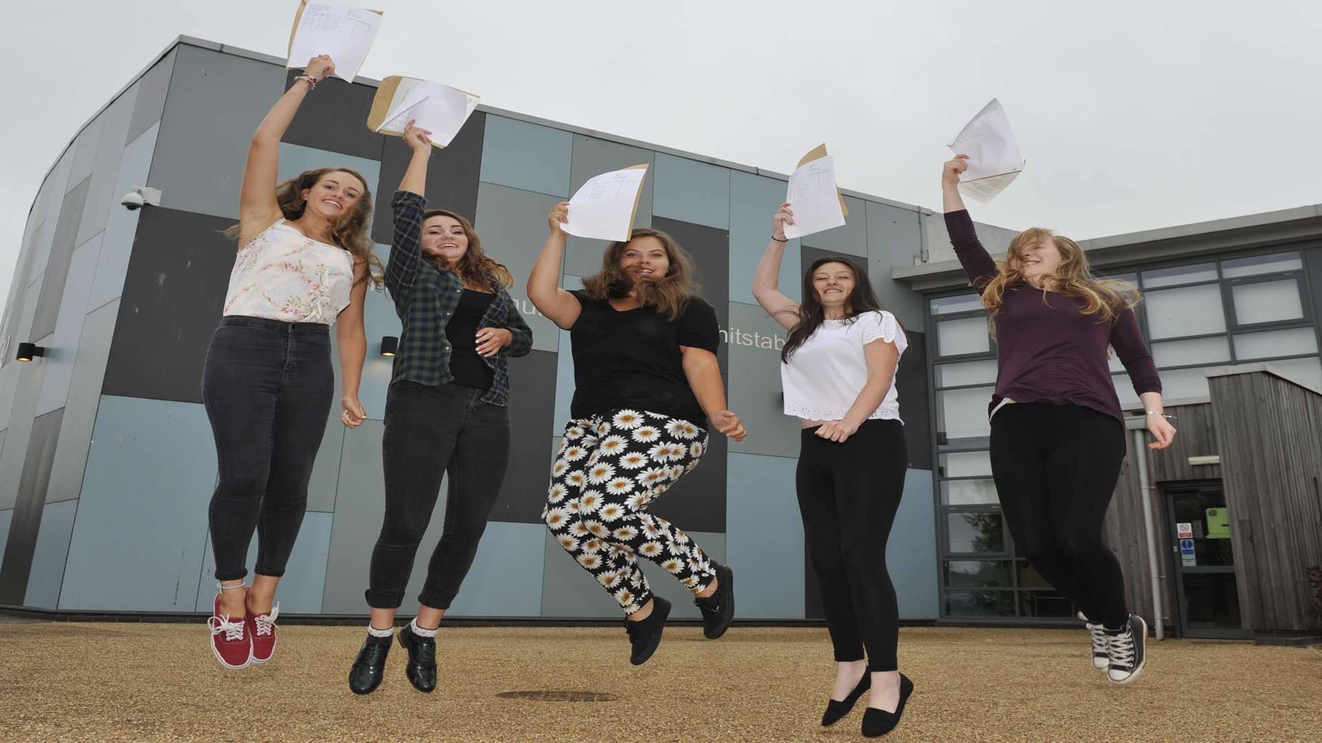Pupils jump for joy at Community College, Whitstable. Picture: Tony Flashman