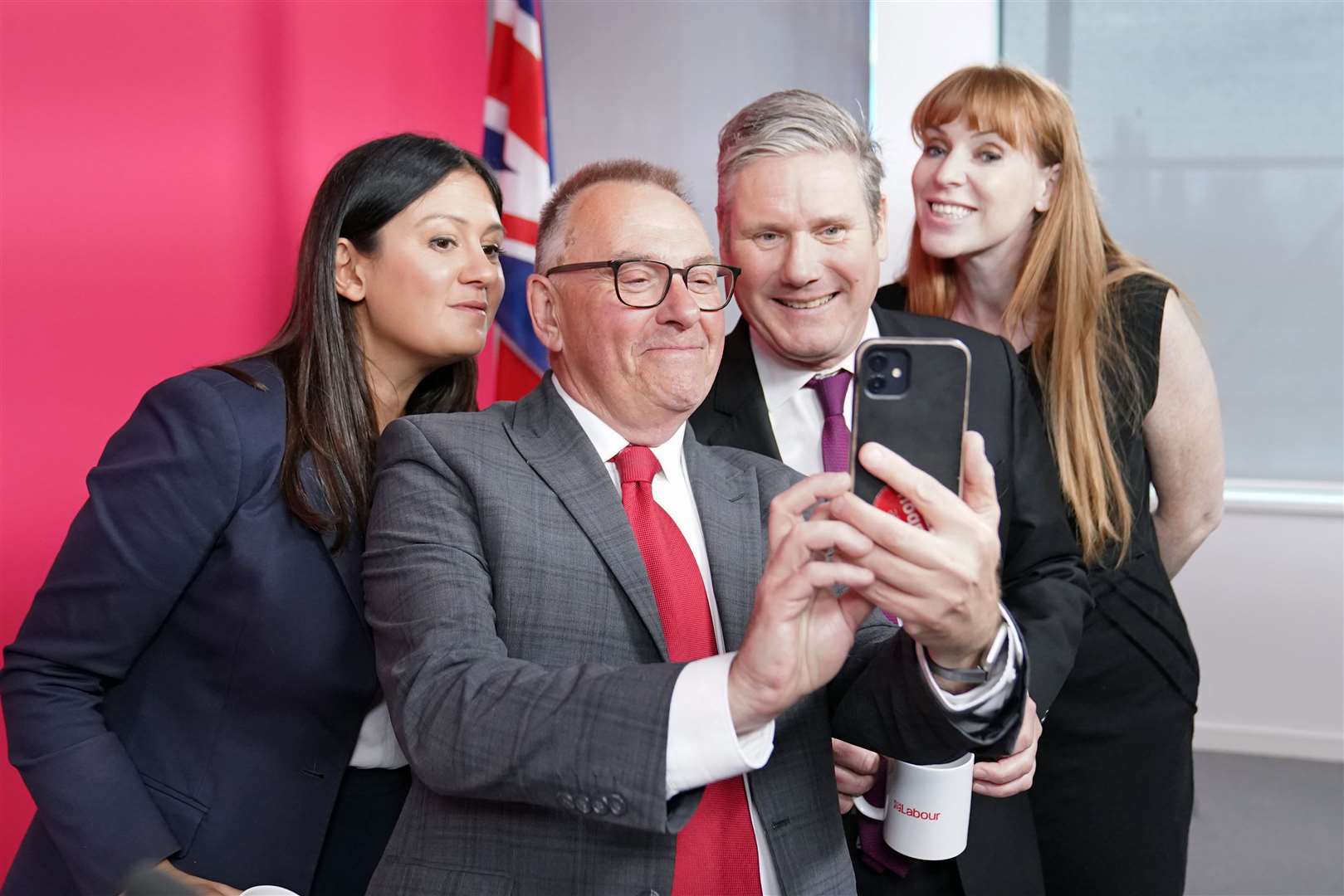 Plymouth City Council leader Tudor Evans takes a selfie with Lisa Nandy, Angela Rayner and Sir Keir Starmer at the meeting (Stefan Rousseau/PA)