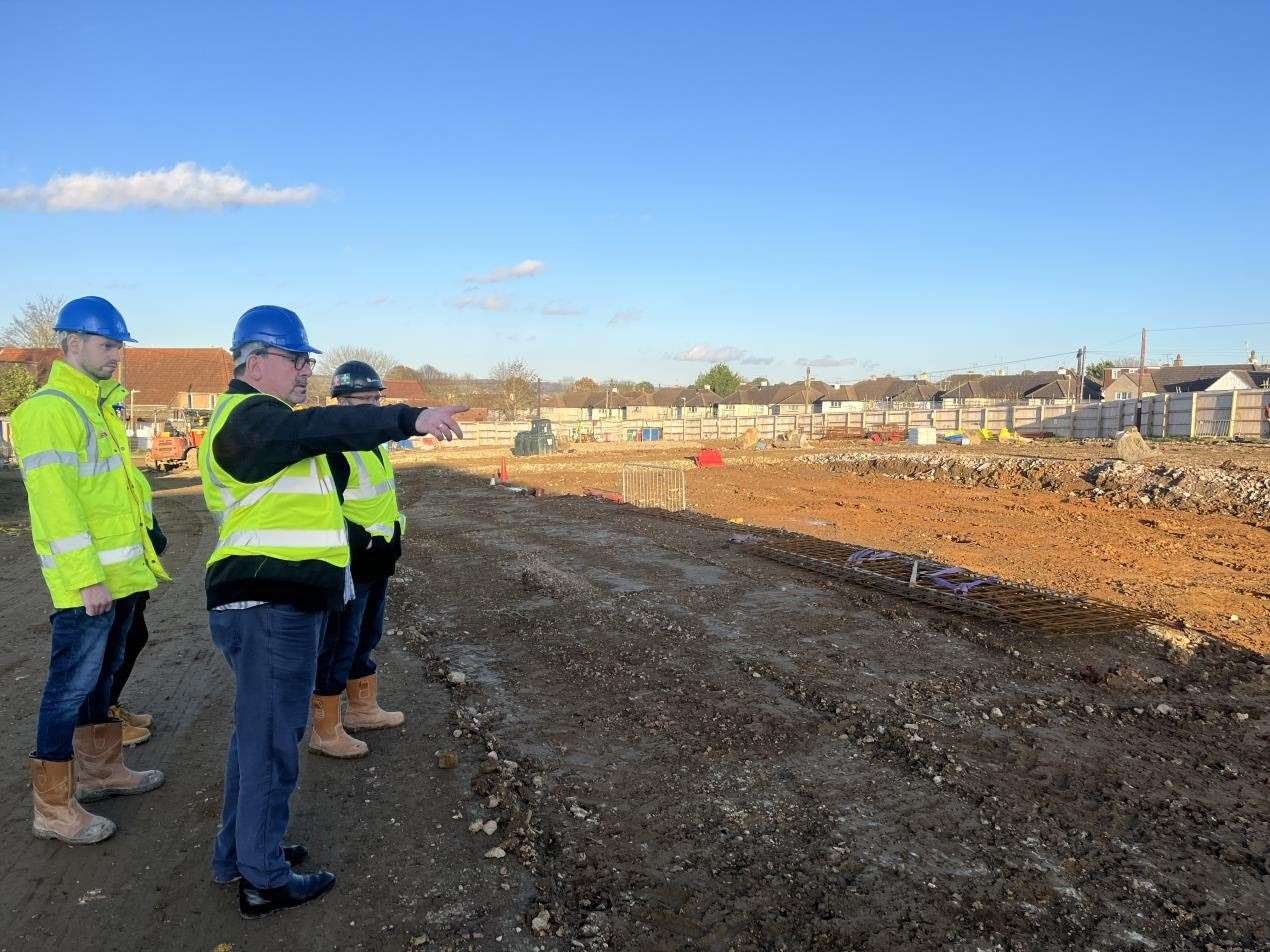 Cllr Simon Wales visits the site with Jon Baldwin, senior development manager at Golding Homes and Danny Parrett, project manager with Golding's contractor Skillcrown