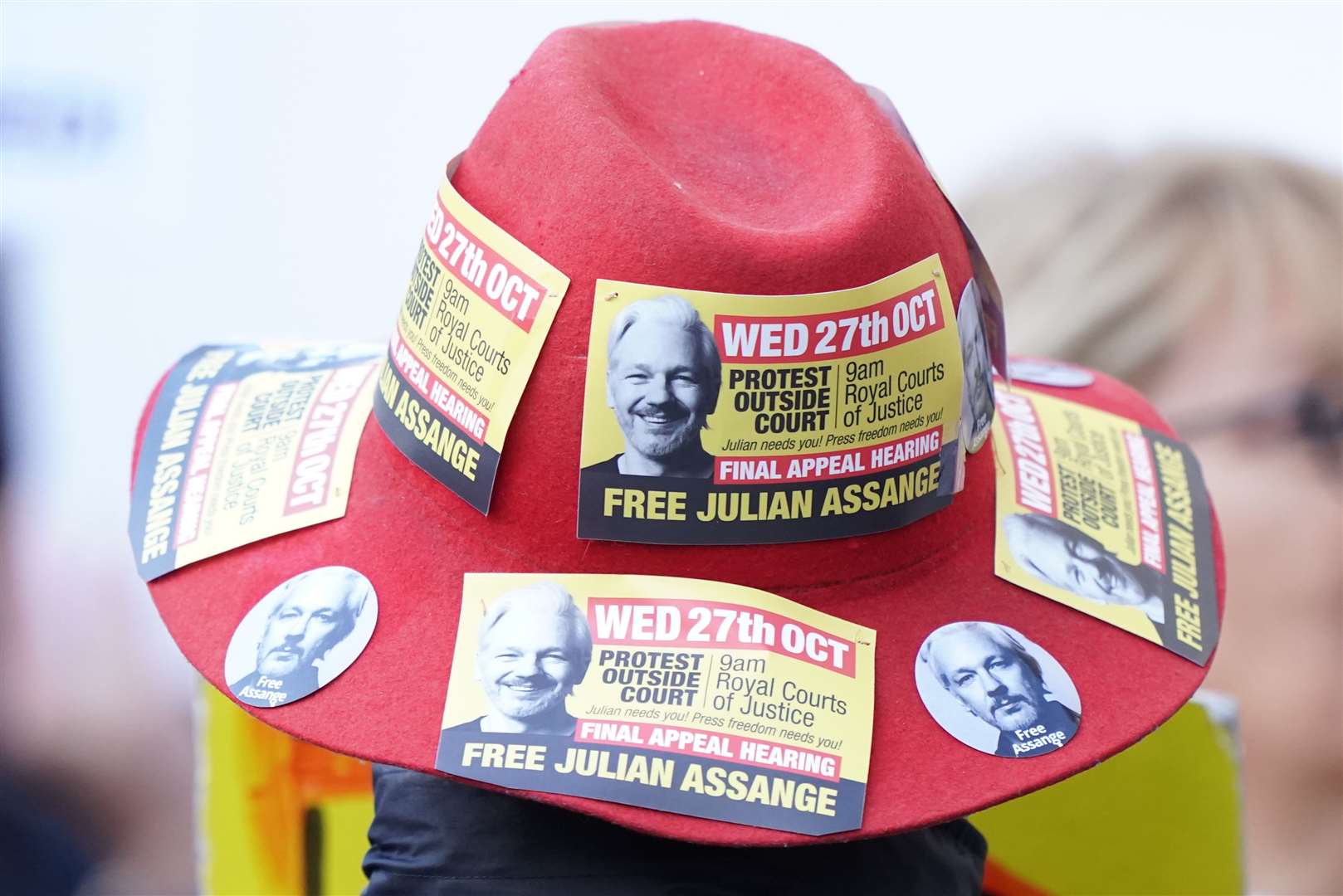 A protester outside the court (Kirsty O’Connor/PA)